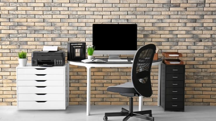 home office furniture; filing cabinet that holds a printer on top of it